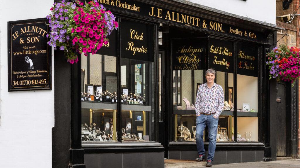 Geoff Allnutt of JE Allnutt & Son in the doorway of his shop in West Street, Midhurst, Sussex.