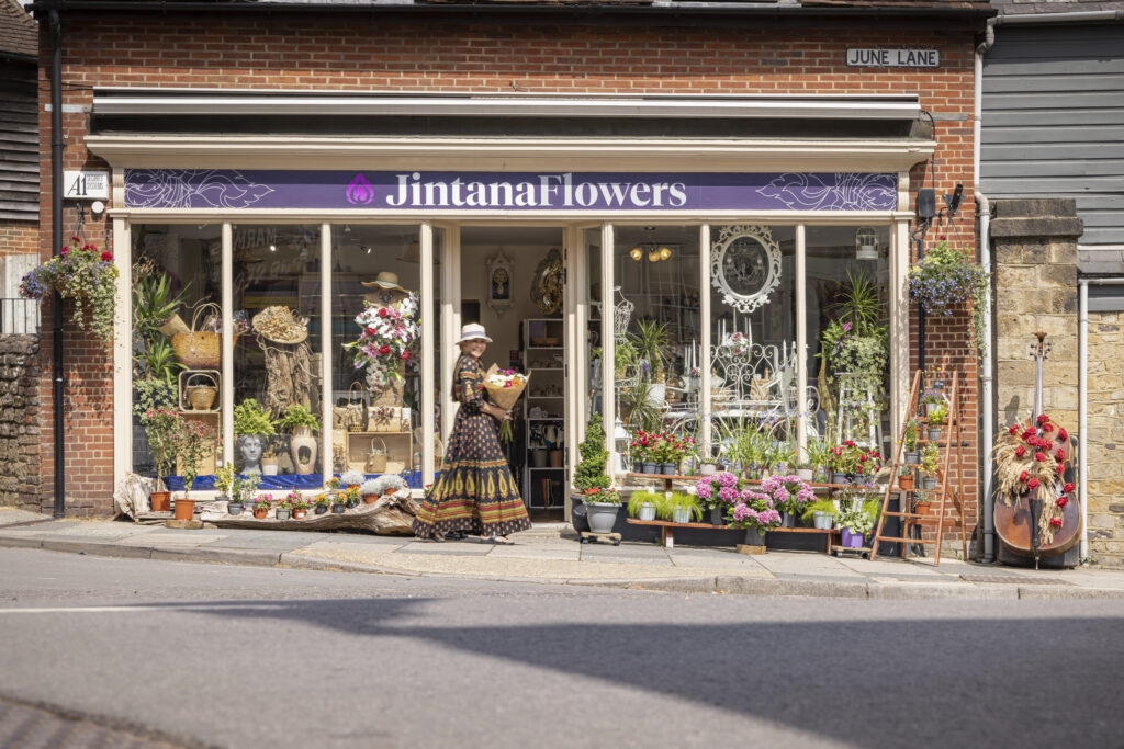 The exterior shop front of Jintana Flowers florist in Midhurst, West Sussex.