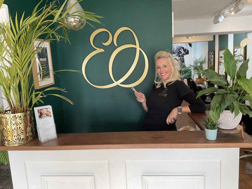 The owner of Emma O'Malley Hair and Beauty stood behind the counter inside the salon.