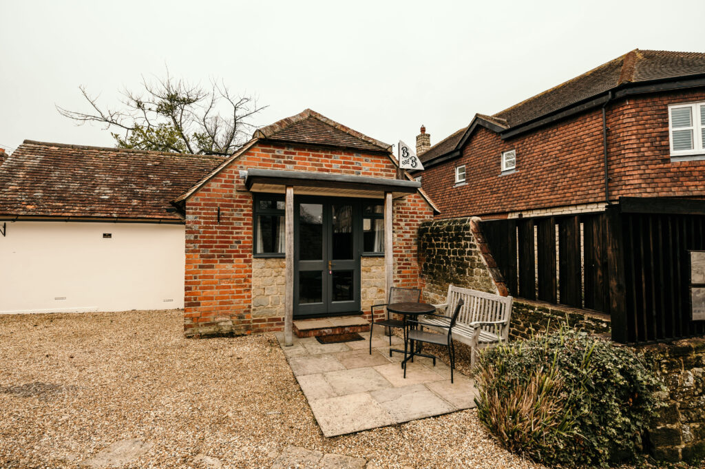 Exterior of the Pear Tree Cottage B&B in Midhurst, on a winter day.