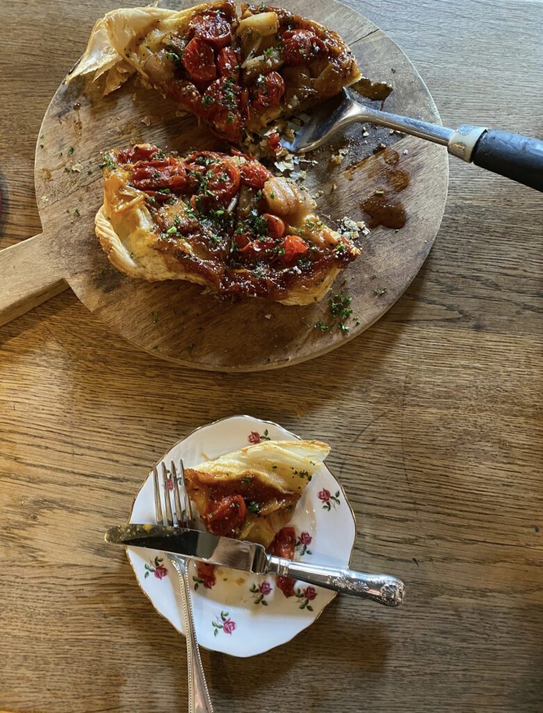 A top down view of a delicious pastry on a wooden table at The Hollist Arms pub, West Sussex.